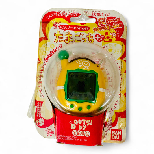 Tamagotchi Plus School – Guts! by TMGC (2006) – Édition Jaune & Verte